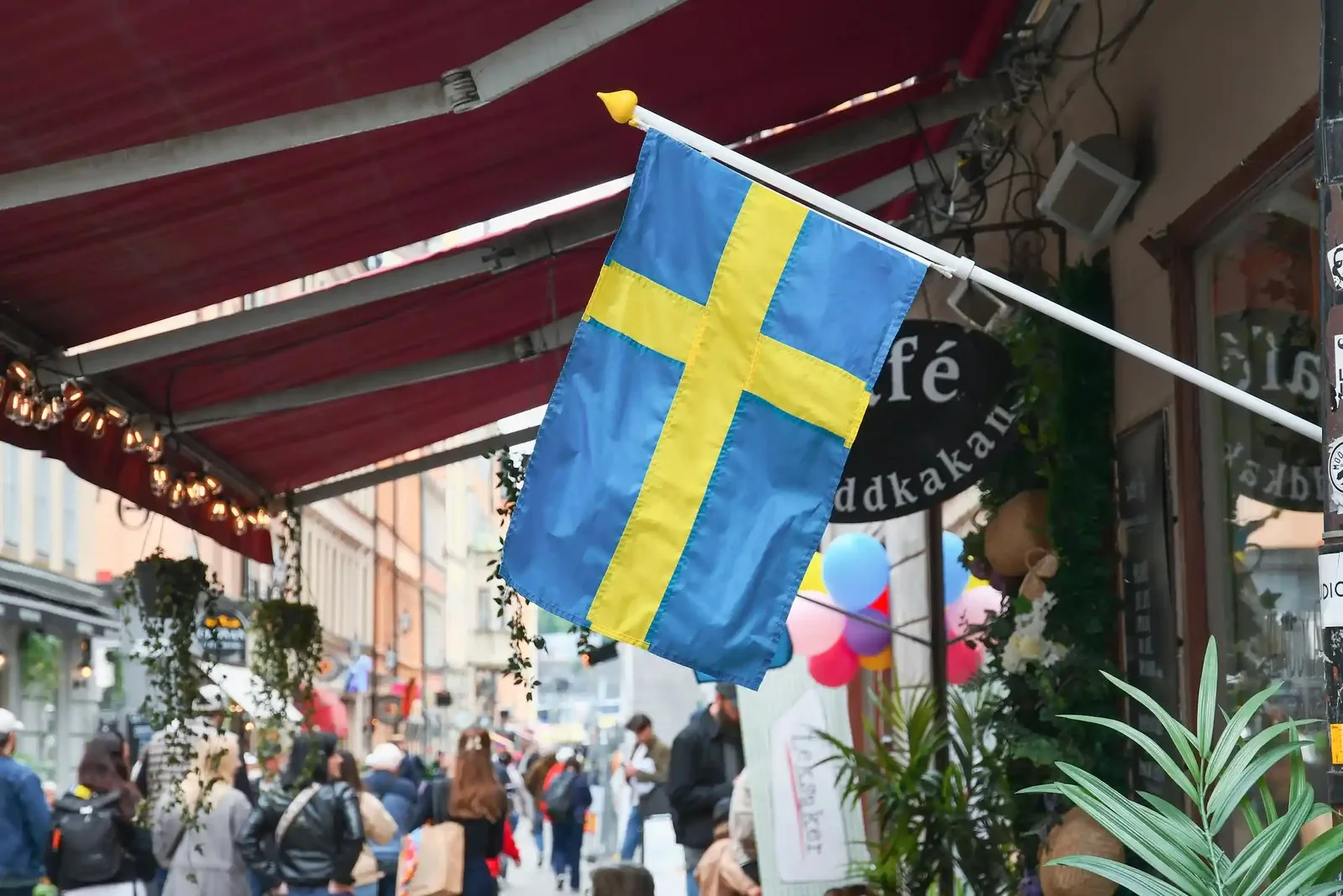 The Swedish flag on a street in Stockholm's old town.