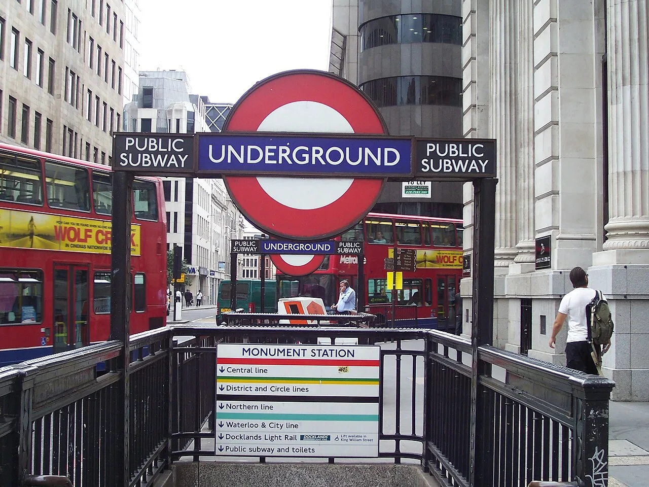 The 'Public Subway' sign at Monument station's entrance refers to the pedestrian subways underneath the junction, not to the London Underground.