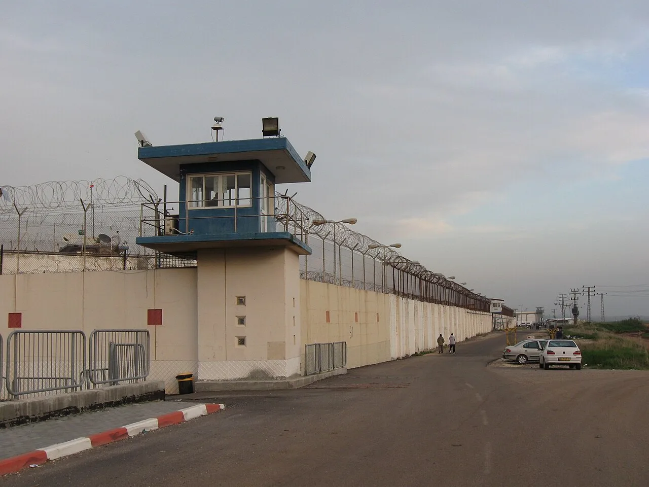 Prisons often have structural features such as barbed or razor wire, motion sensors, high walls and guard towers to prevent escape.