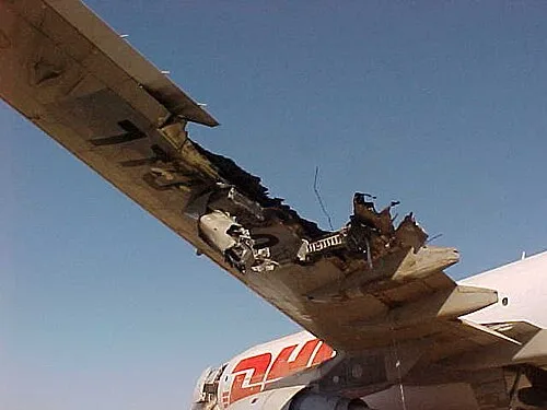 A damaged plane wing from the 2003 shootdown attempt