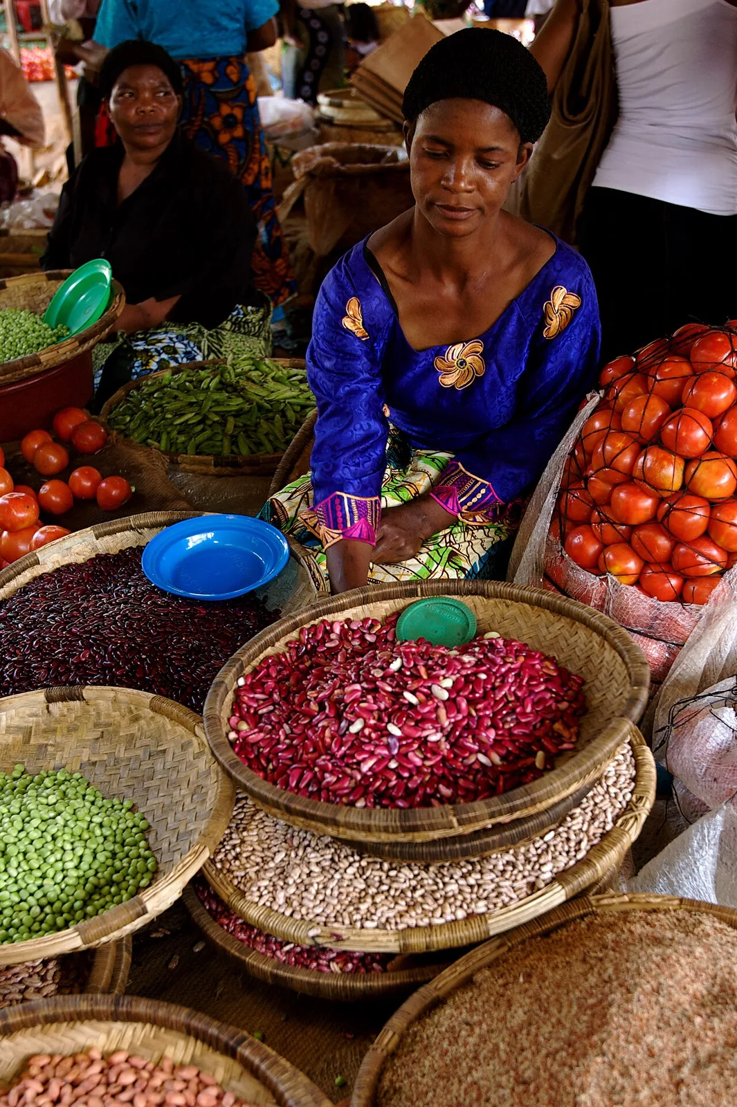 Women selling produce at a market in Lilongwe, Malawi