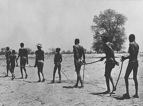 Children leading adults who became blind from onchocerciasis in Africa