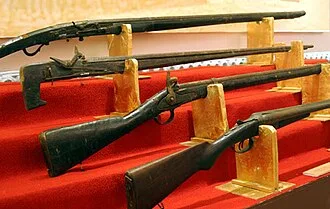 Two Vietnamese matchlock guns (first and second from above).